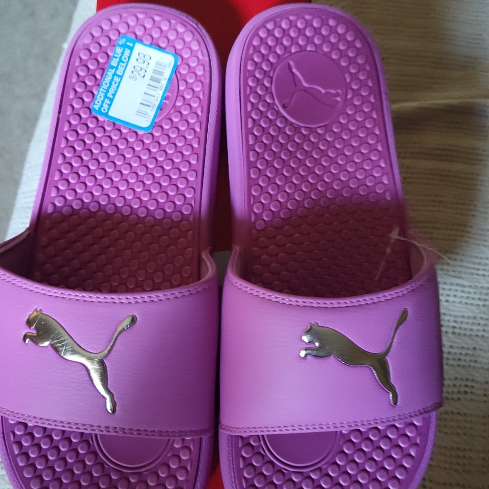 Pink PUMA Slip o n s